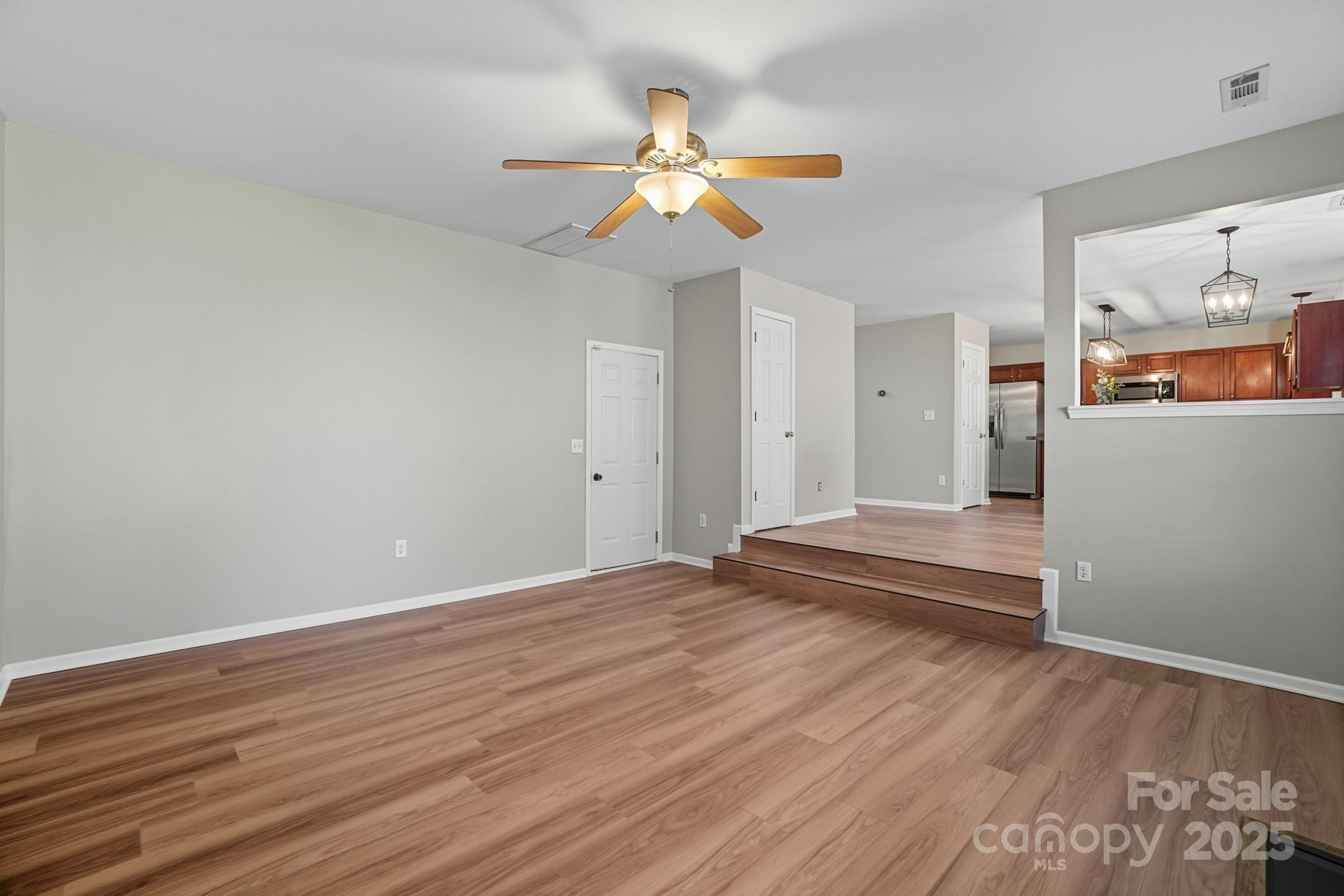 3060 Rocket Road Rock Hill, SC 29732 - Photo 16 of 31 a view of an empty room with wooden floor