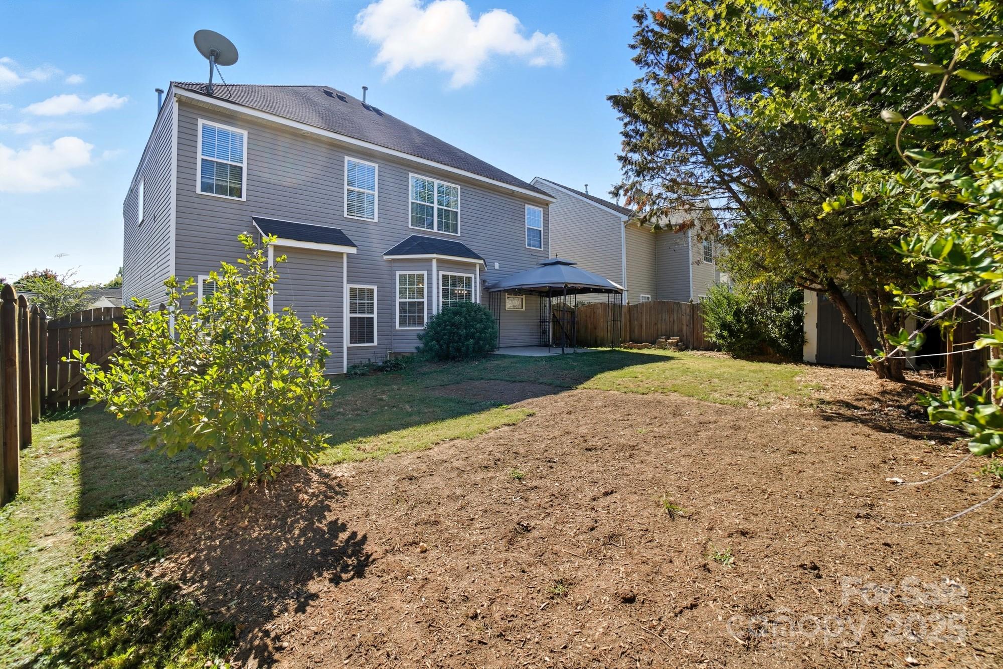 3060 Rocket Road Rock Hill, SC 29732 - Photo 30 of 31 a front view of a house with a yard and trees
