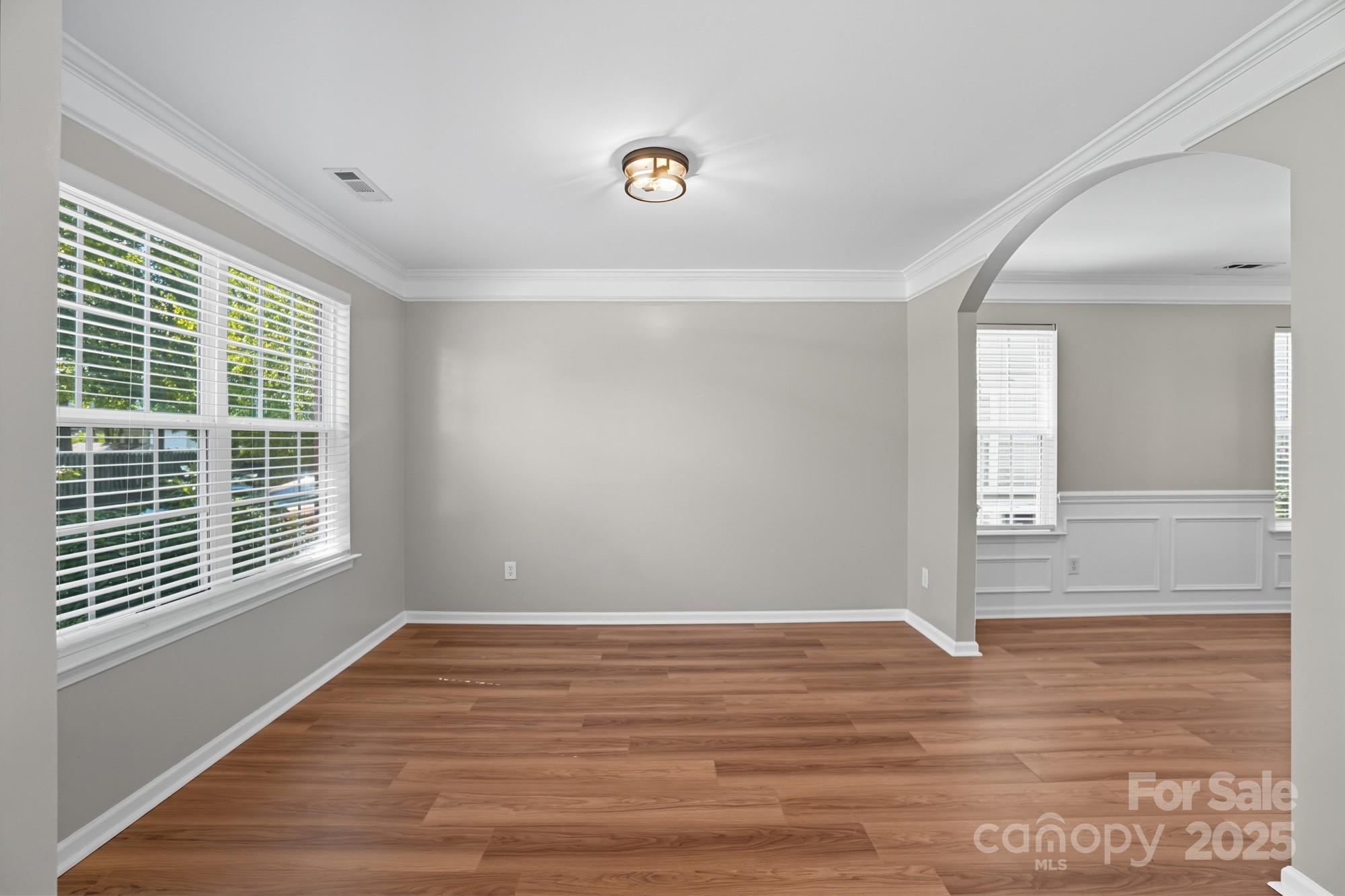 3060 Rocket Road Rock Hill, SC 29732 - Photo 5 of 31 a view of an empty room with wooden floor and a window