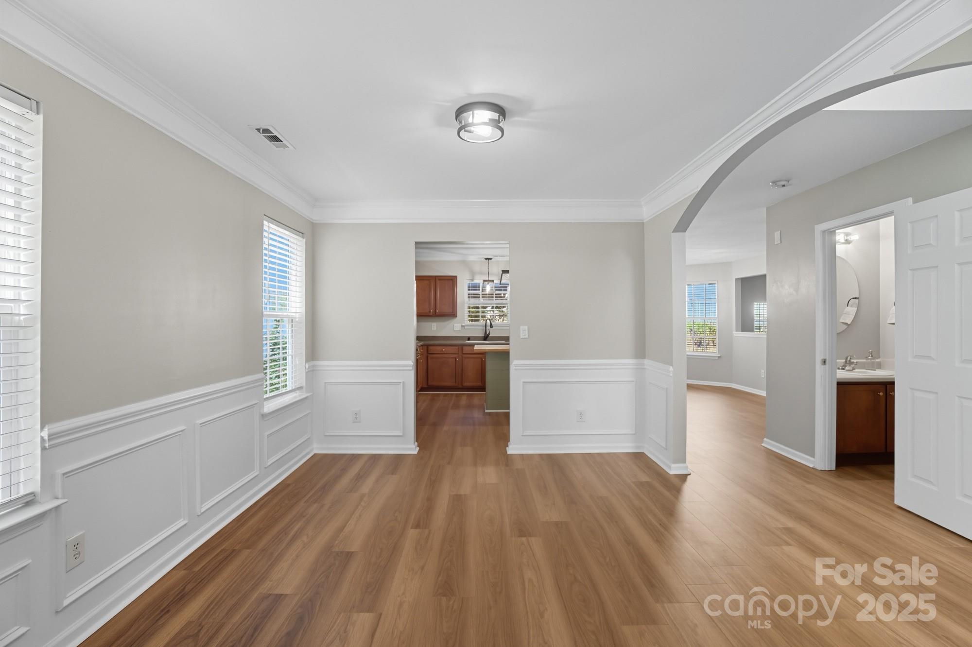 3060 Rocket Road Rock Hill, SC 29732 - Photo 7 of 31 a view of a big room with wooden floor and windows