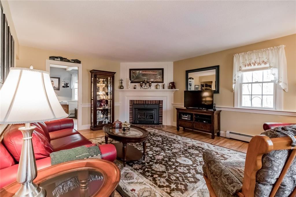13 Pine Ridge Road Saco, ME 04072 - Photo 17 of 35 Large living room with gas fireplace