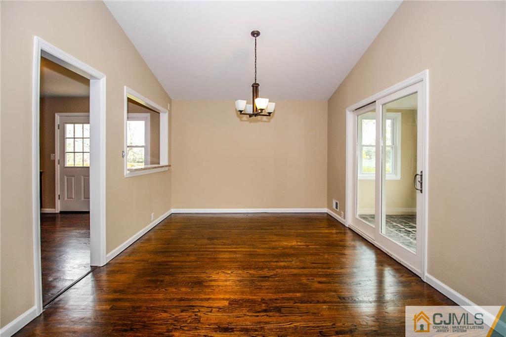 44 Harmon Road Edison, NJ 08837 - Photo 8 of 25 a view of a room with wooden floor and window