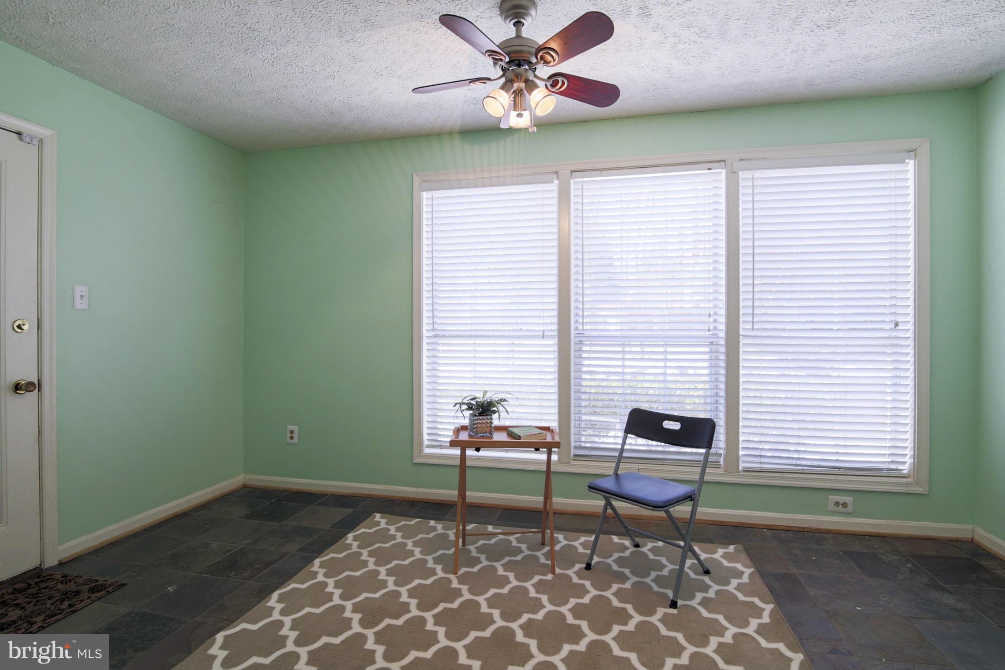 10153 Oakton Terrace Road, Unit 10153 Oakton, VA 22124 - Photo 18 of 23 Sunroom with ceramic tile floor