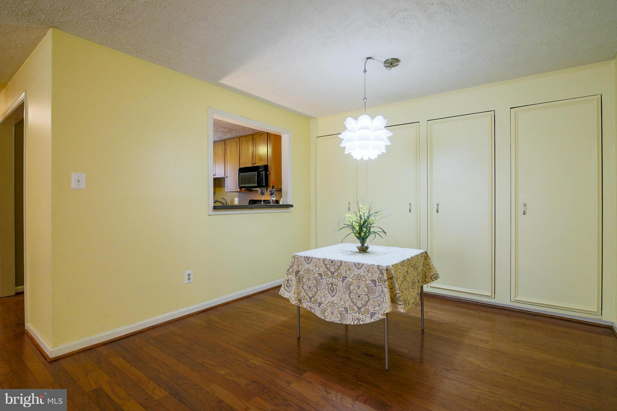 10153 Oakton Terrace Road, Unit 10153 Oakton, VA 22124 - Photo 5 of 23 Dining Room with pass-through to Kitchen