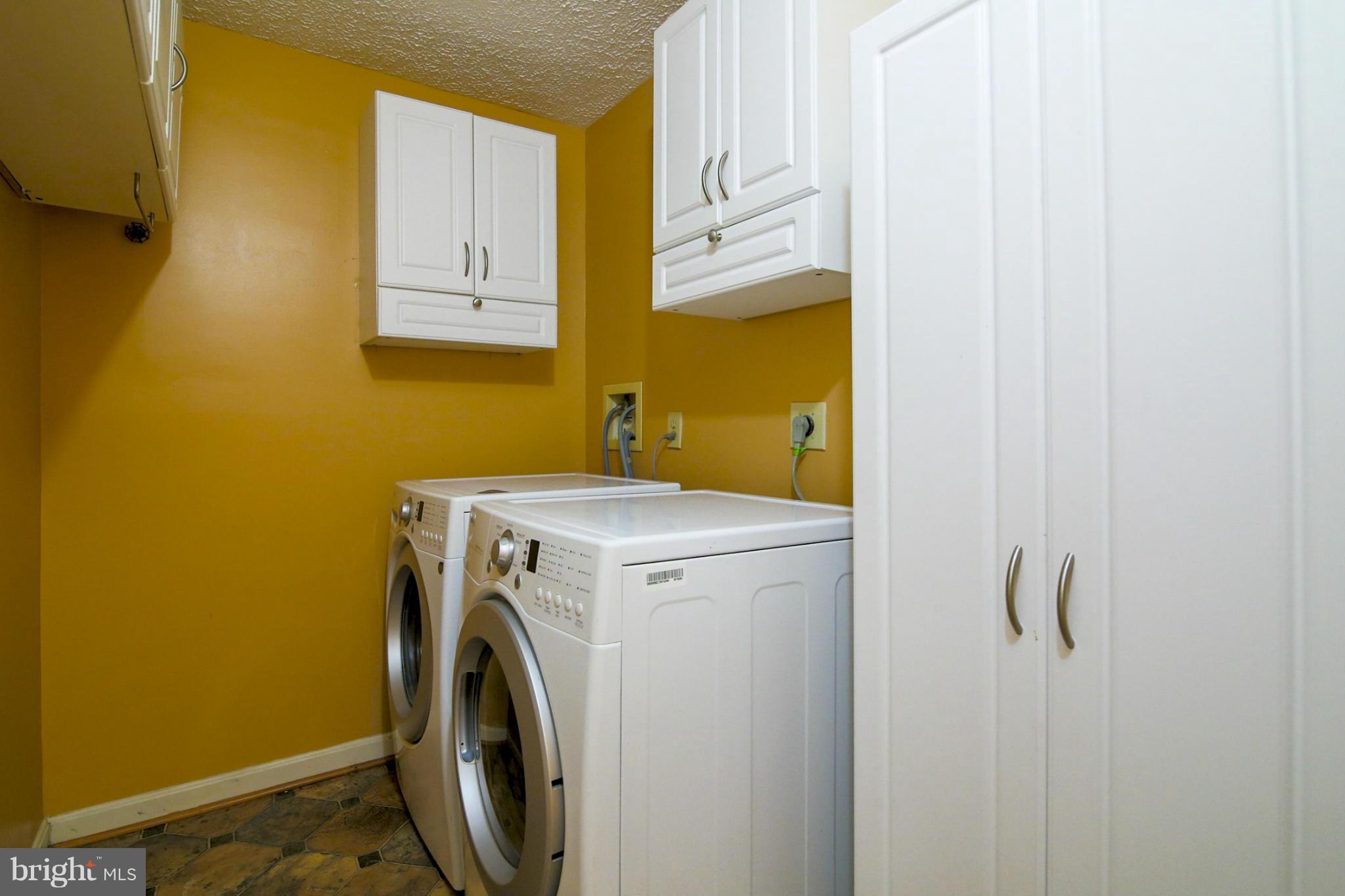 10153 Oakton Terrace Road, Unit 10153 Oakton, VA 22124 - Photo 10 of 23 Laundry Room with LG front loading washer