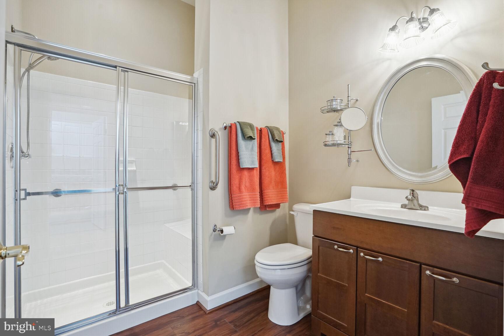 12036 Rutherglen Place Bristow, VA 20136 - Photo 13 of 39 Main level hall bath has new vanity and flooring