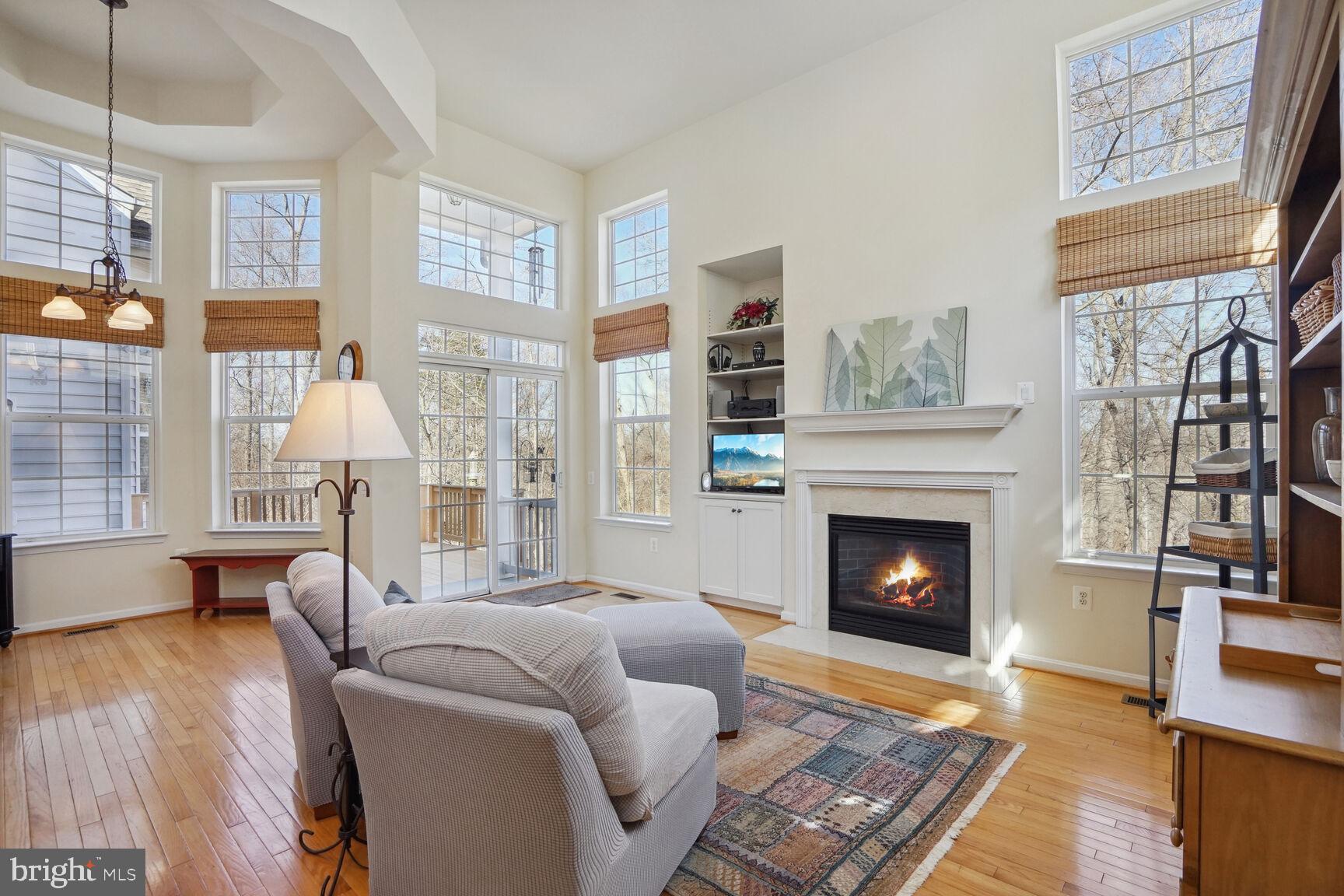 12036 Rutherglen Place Bristow, VA 20136 - Photo 21 of 39 Family room with cozy gas fireplace