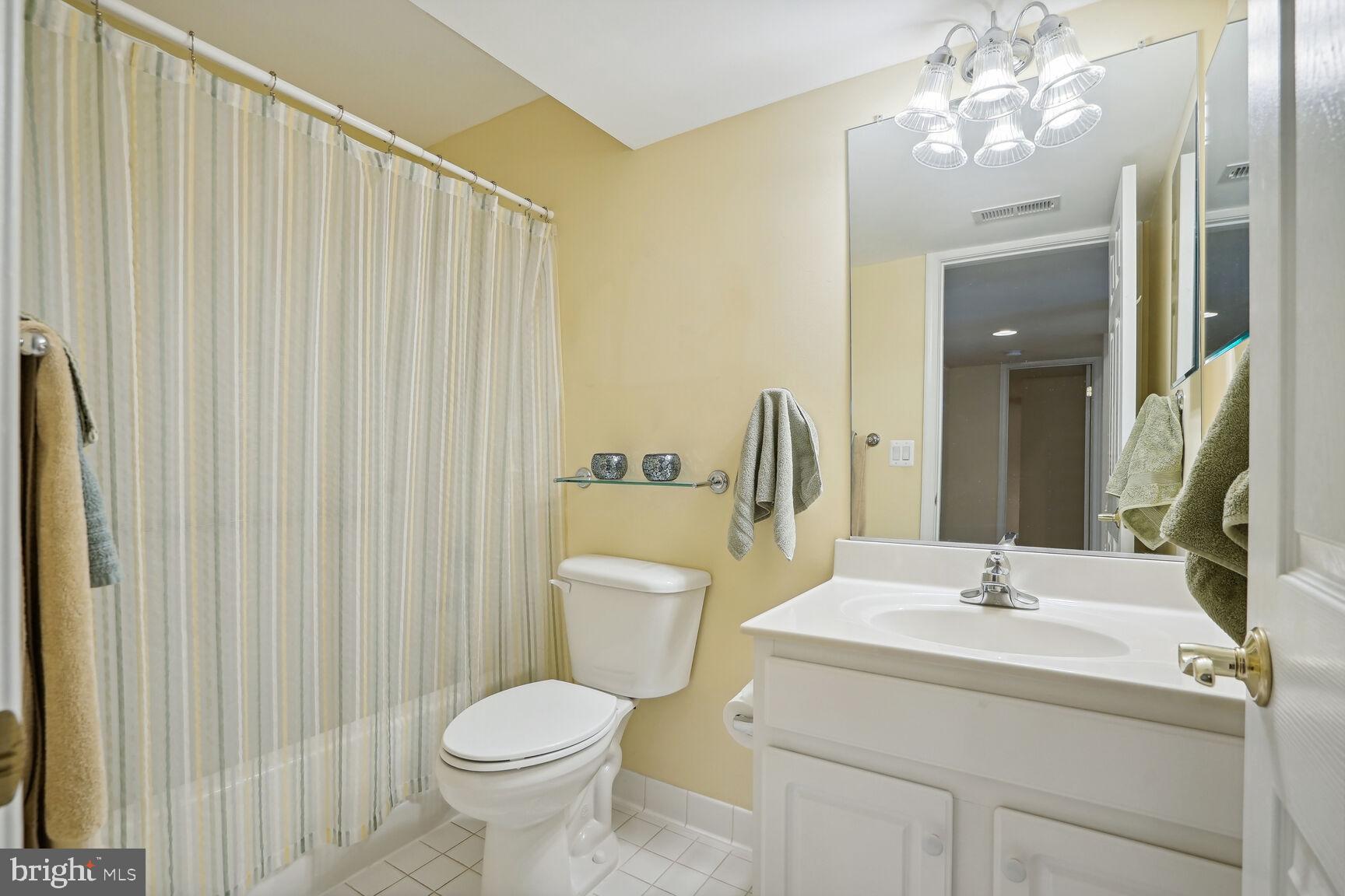12036 Rutherglen Place Bristow, VA 20136 - Photo 24 of 39 Lower level bathroom with tub/shower combination