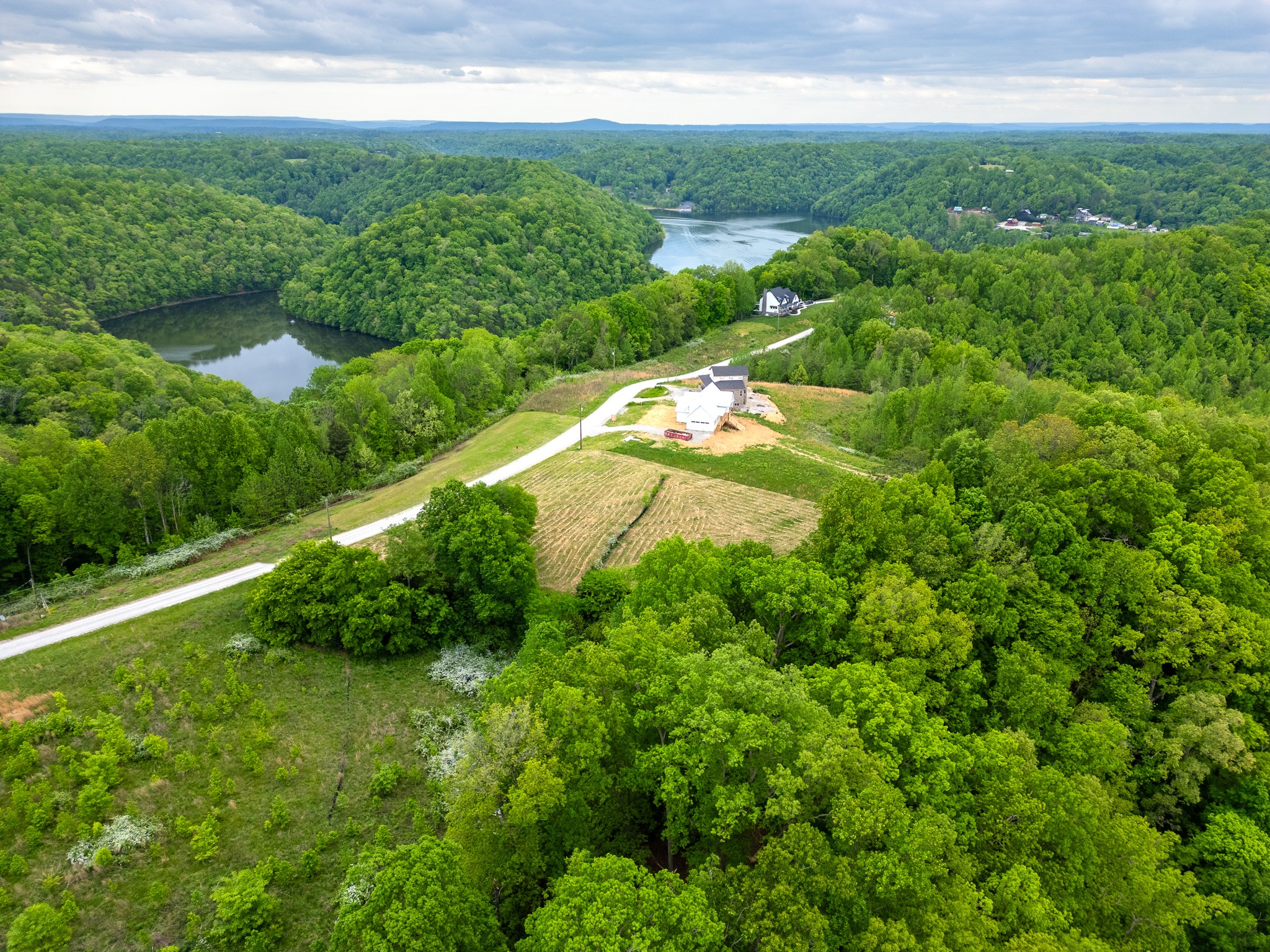 0 Lake Bluff Baxter, TN 38544 - Photo 12 of 23 a view of a lake with a yard