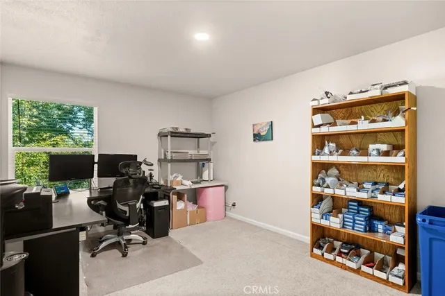 a view of a livingroom with furniture