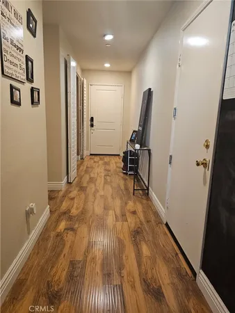 a view of workspace with wooden floor