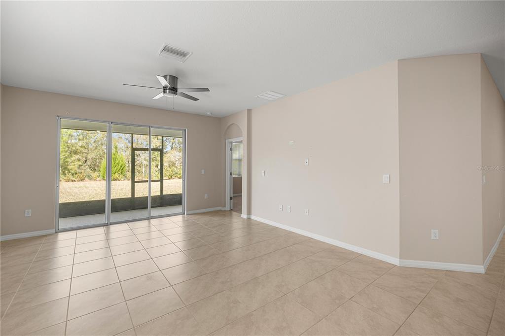 5369 Northwest 48th Lane Ocala, FL 34482 - Photo 11 of 47 a view of an empty room with a window