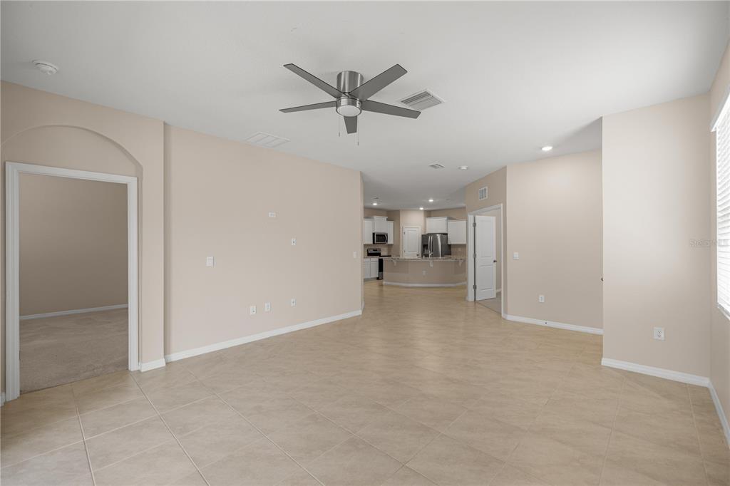 5369 Northwest 48th Lane Ocala, FL 34482 - Photo 13 of 47 a view of a livingroom with a ceiling fan