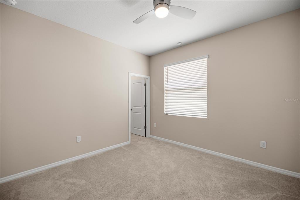5369 Northwest 48th Lane Ocala, FL 34482 - Photo 21 of 47 an empty room with a window