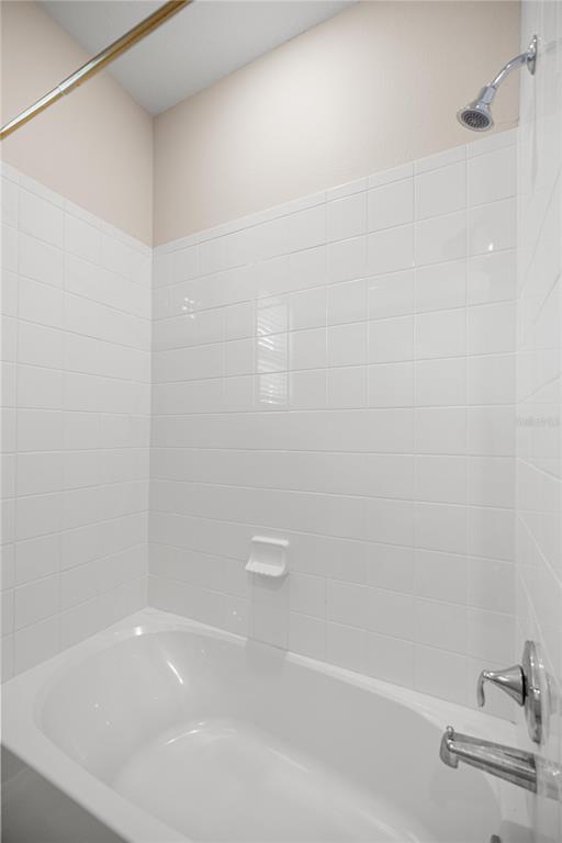 5369 Northwest 48th Lane Ocala, FL 34482 - Photo 25 of 47 a bathroom with a bathtub