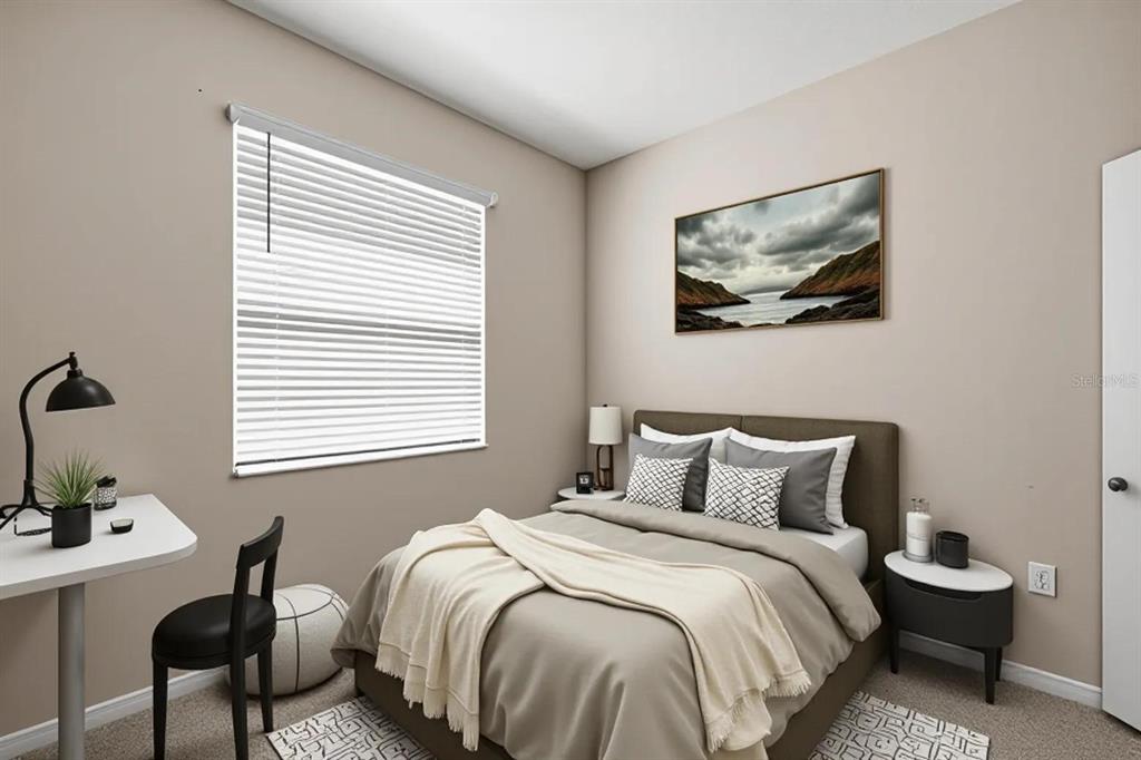 5369 Northwest 48th Lane Ocala, FL 34482 - Photo 26 of 47 a bedroom with a bed and chair