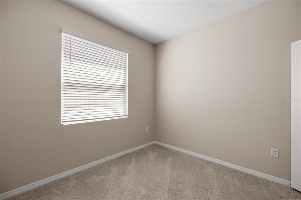 5369 Northwest 48th Lane Ocala, FL 34482 - Photo 27 of 47 an empty room with a window