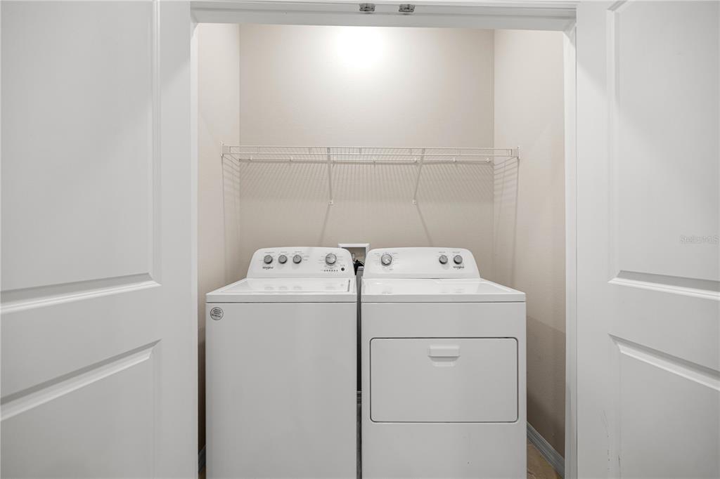5369 Northwest 48th Lane Ocala, FL 34482 - Photo 29 of 47 a utility room with dryer and washer