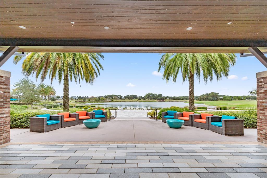5369 Northwest 48th Lane Ocala, FL 34482 - Photo 46 of 47 swimming pool and outdoor seating