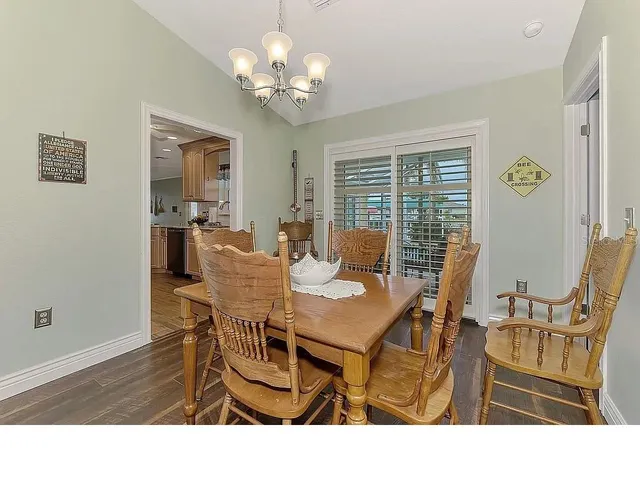 a bathroom with a sink double vanity granite and a mirror