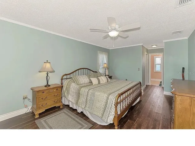 a bathroom with a sink vanity granite and a mirror