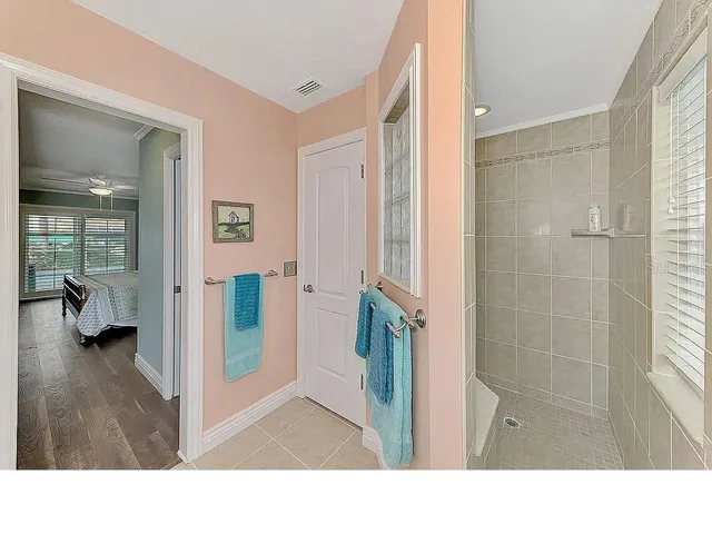 a kitchen with a refrigerator and a sink