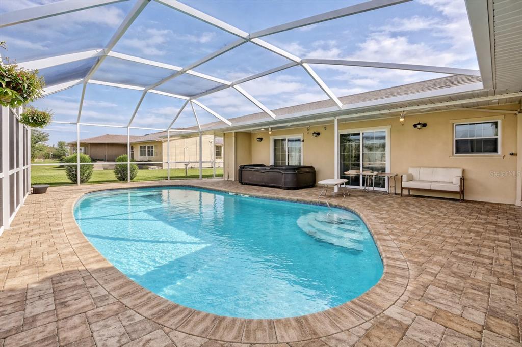 5231 Conner Terrace Port Charlotte, FL 33981 - Photo 47 of 66 a view of a swimming pool with a patio