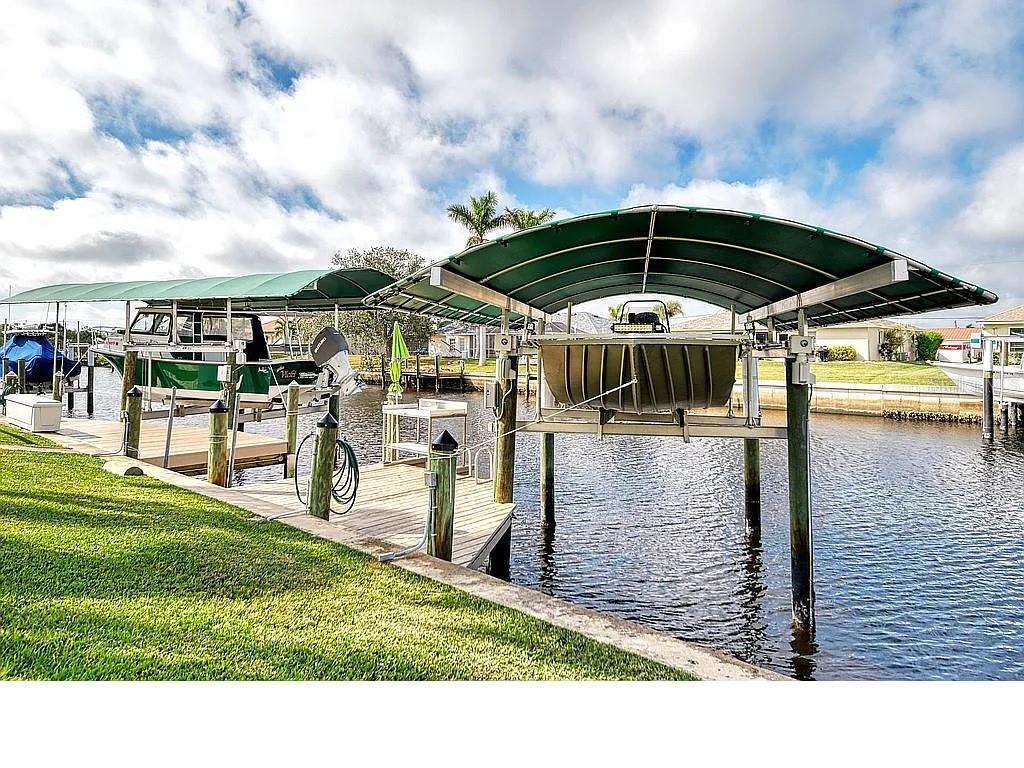 5231 Conner Terrace Port Charlotte, FL 33981 - Photo 53 of 66 a view of a chairs and table in the patio