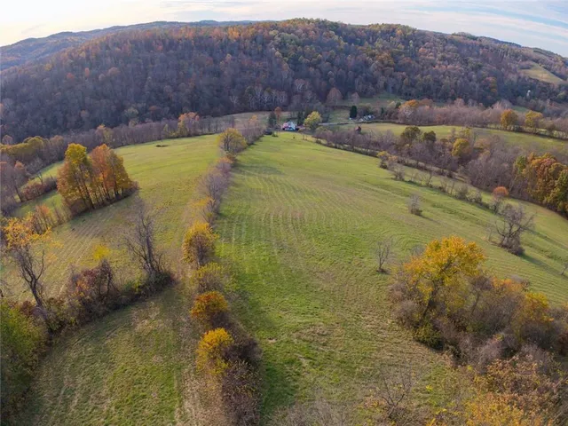 a room with furniture and musical instruments
