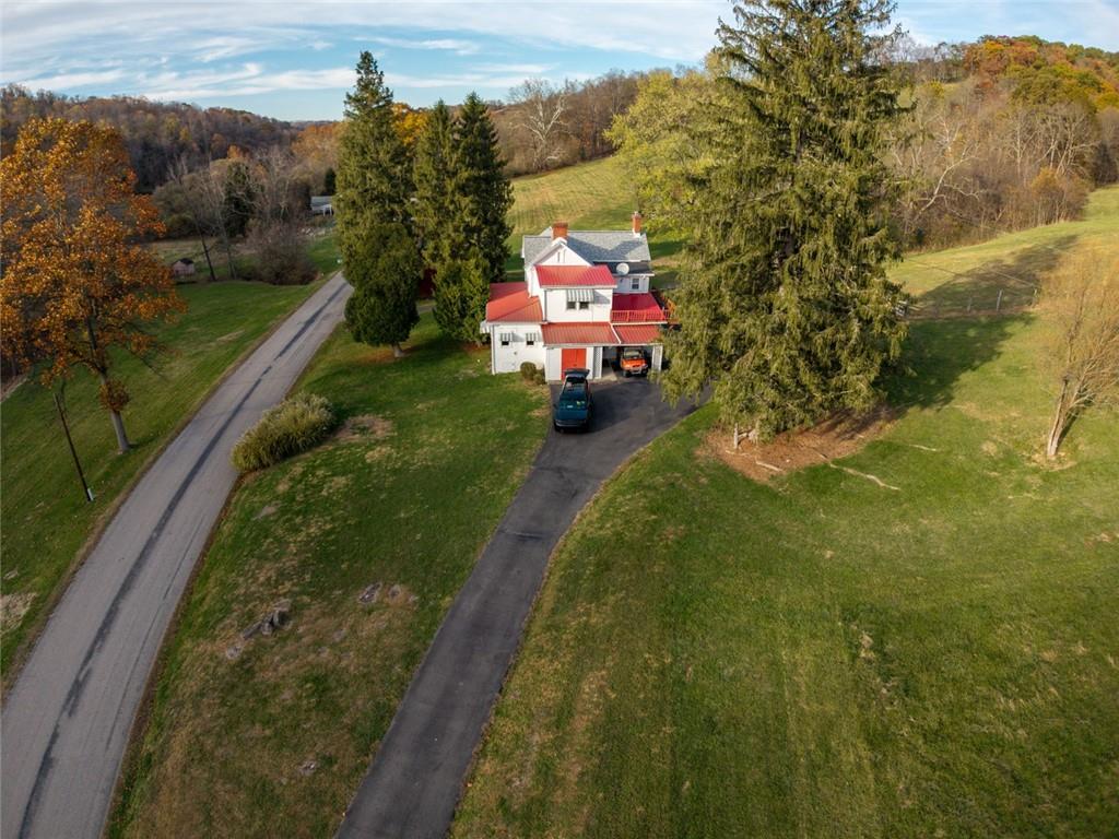 195 West W Railroad Road Sycamore, PA 15364 - Photo 2 of 50 a bird view of a house with a yard