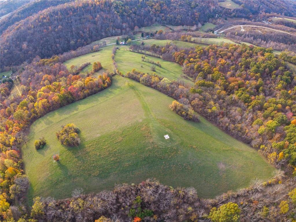 195 West W Railroad Road Sycamore, PA 15364 - Photo 21 of 50 a view of a lake from a yard