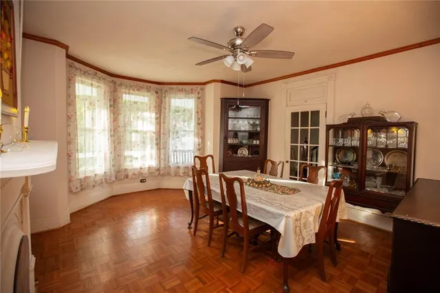 a kitchen that has a sink and a stove in it