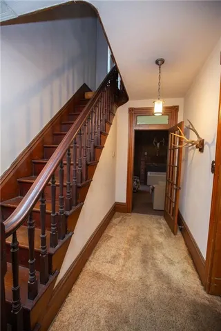 a room with a bed and a window