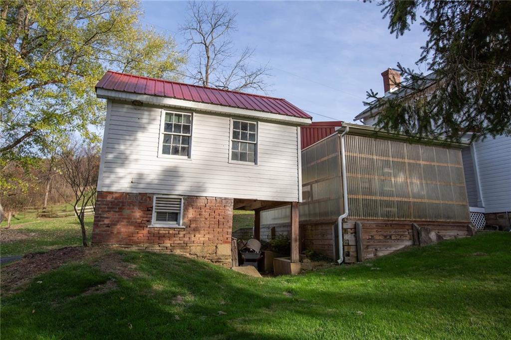 195 West W Railroad Road Sycamore, PA 15364 - Photo 6 of 50 a view of a house with a yard
