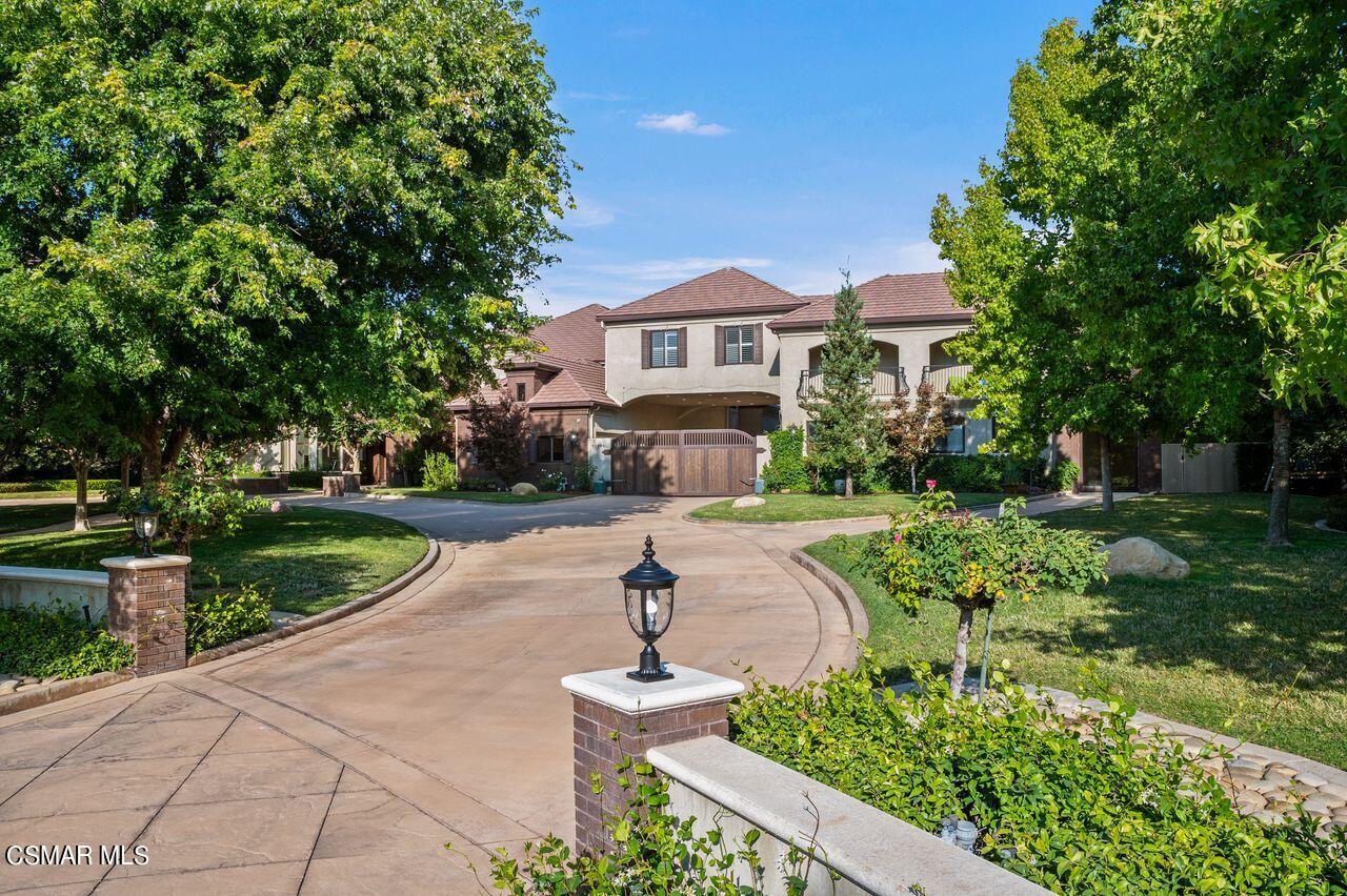12490 MacDonald Drive Ojai, CA 93023 - Photo 2 of 87 a front view of a house with a yard