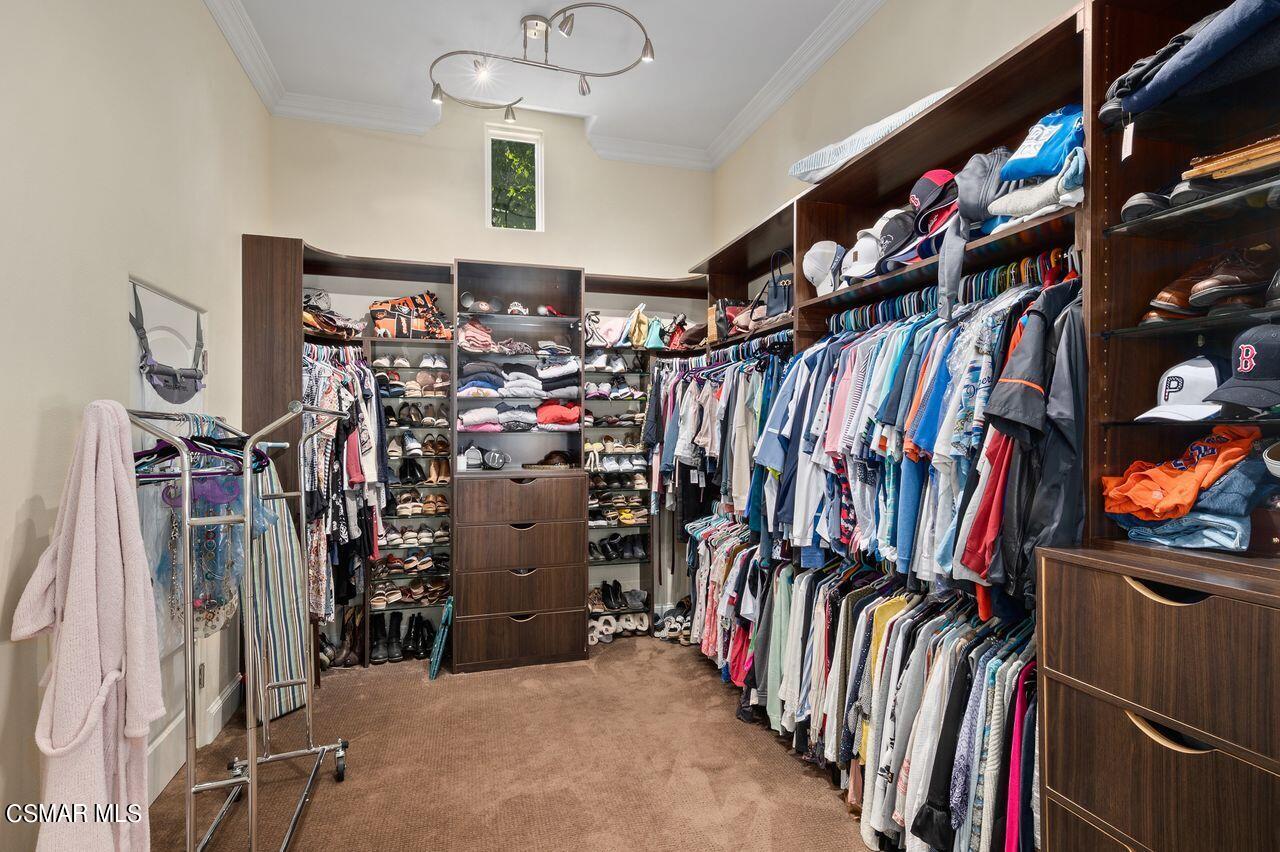 12490 MacDonald Drive Ojai, CA 93023 - Photo 20 of 87 a view of walk in closet with clothes