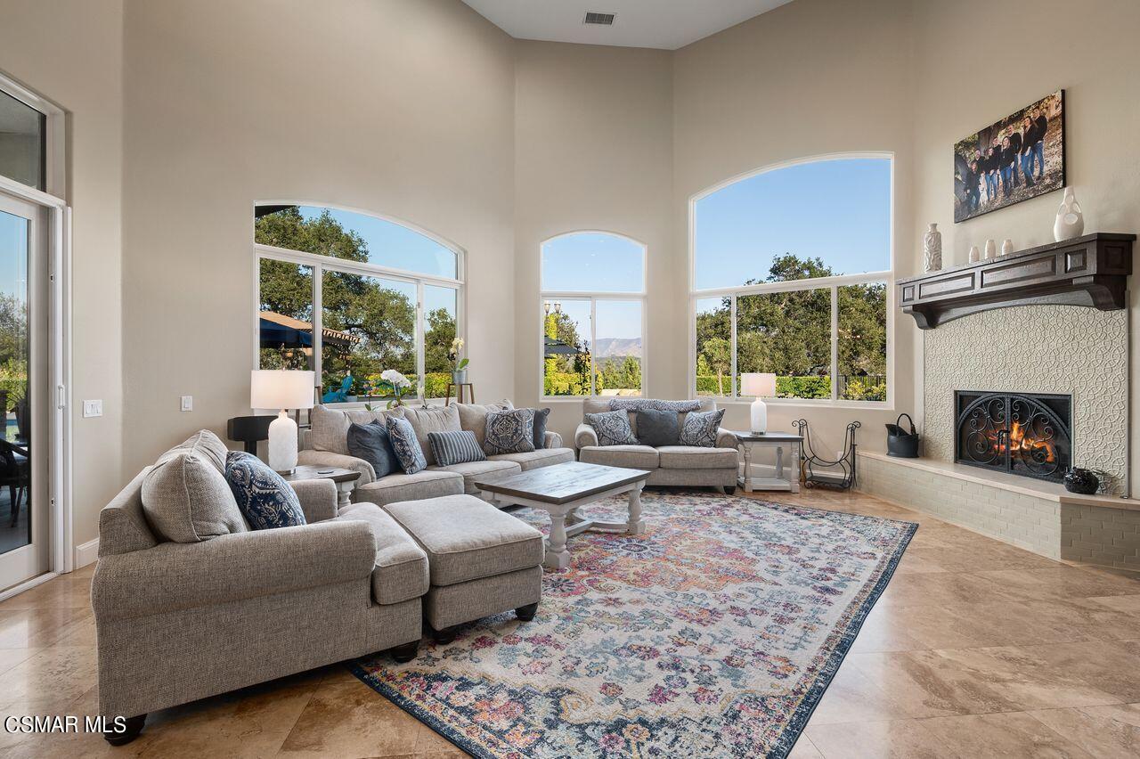12490 MacDonald Drive Ojai, CA 93023 - Photo 26 of 87 a living room with furniture and a fireplace