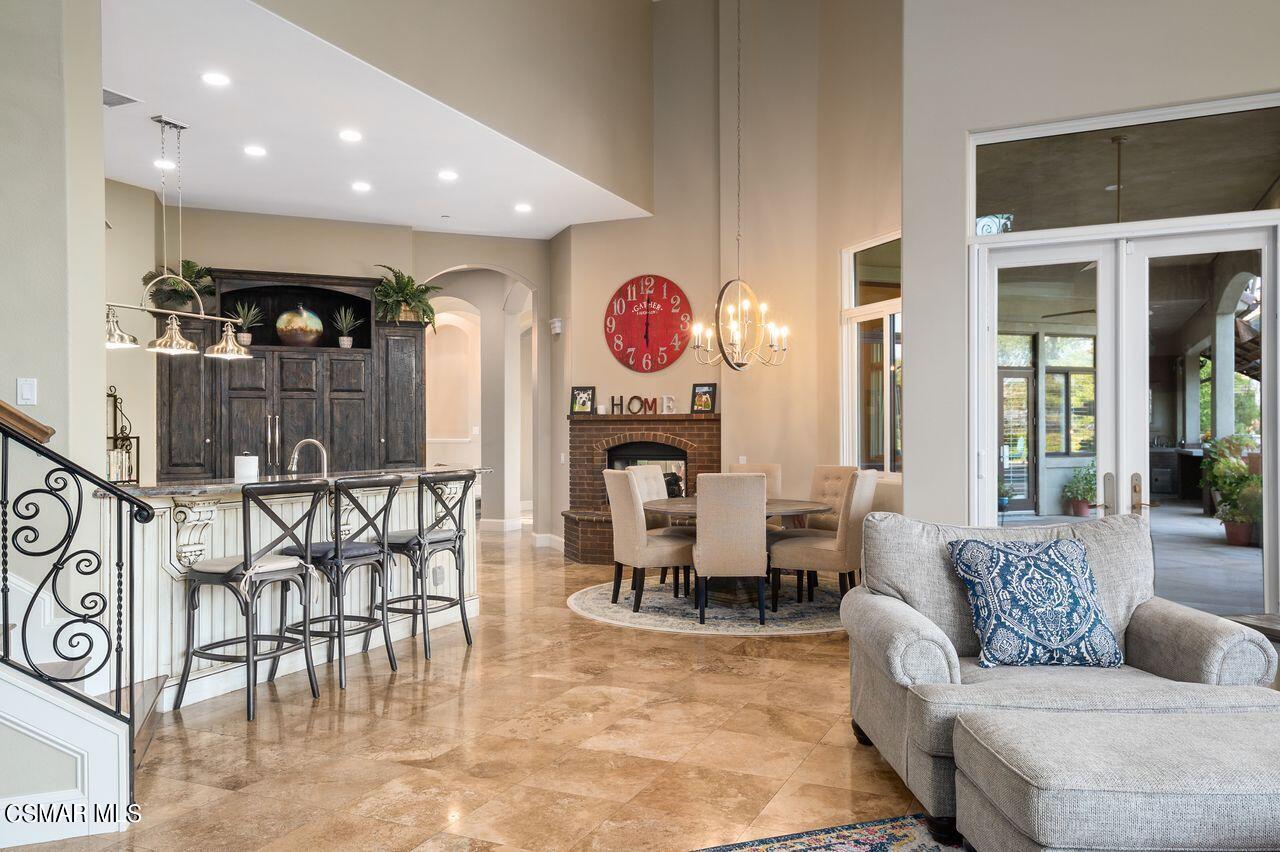12490 MacDonald Drive Ojai, CA 93023 - Photo 28 of 87 a living room with furniture kitchen view and a large window