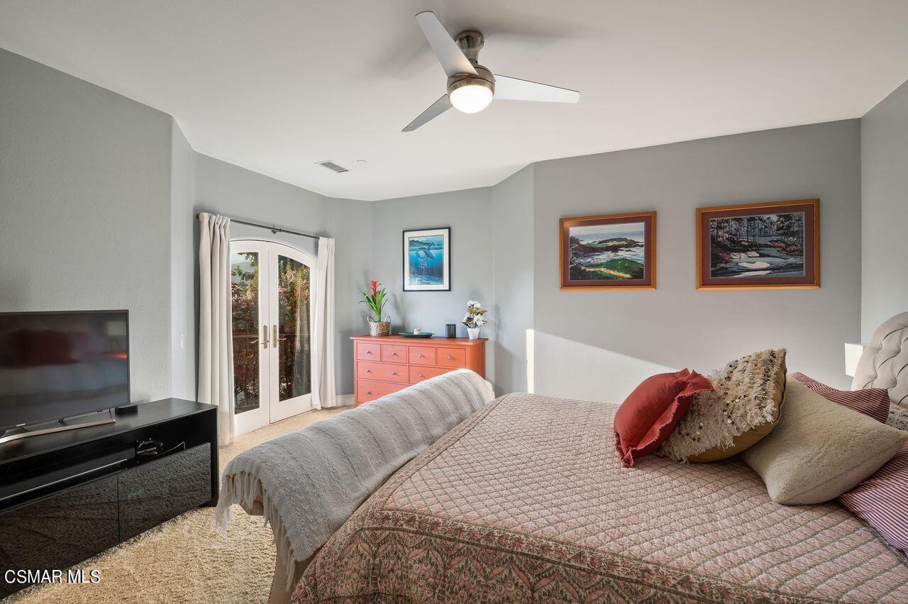 12490 MacDonald Drive Ojai, CA 93023 - Photo 40 of 87 a bedroom with a bed and a flat screen tv