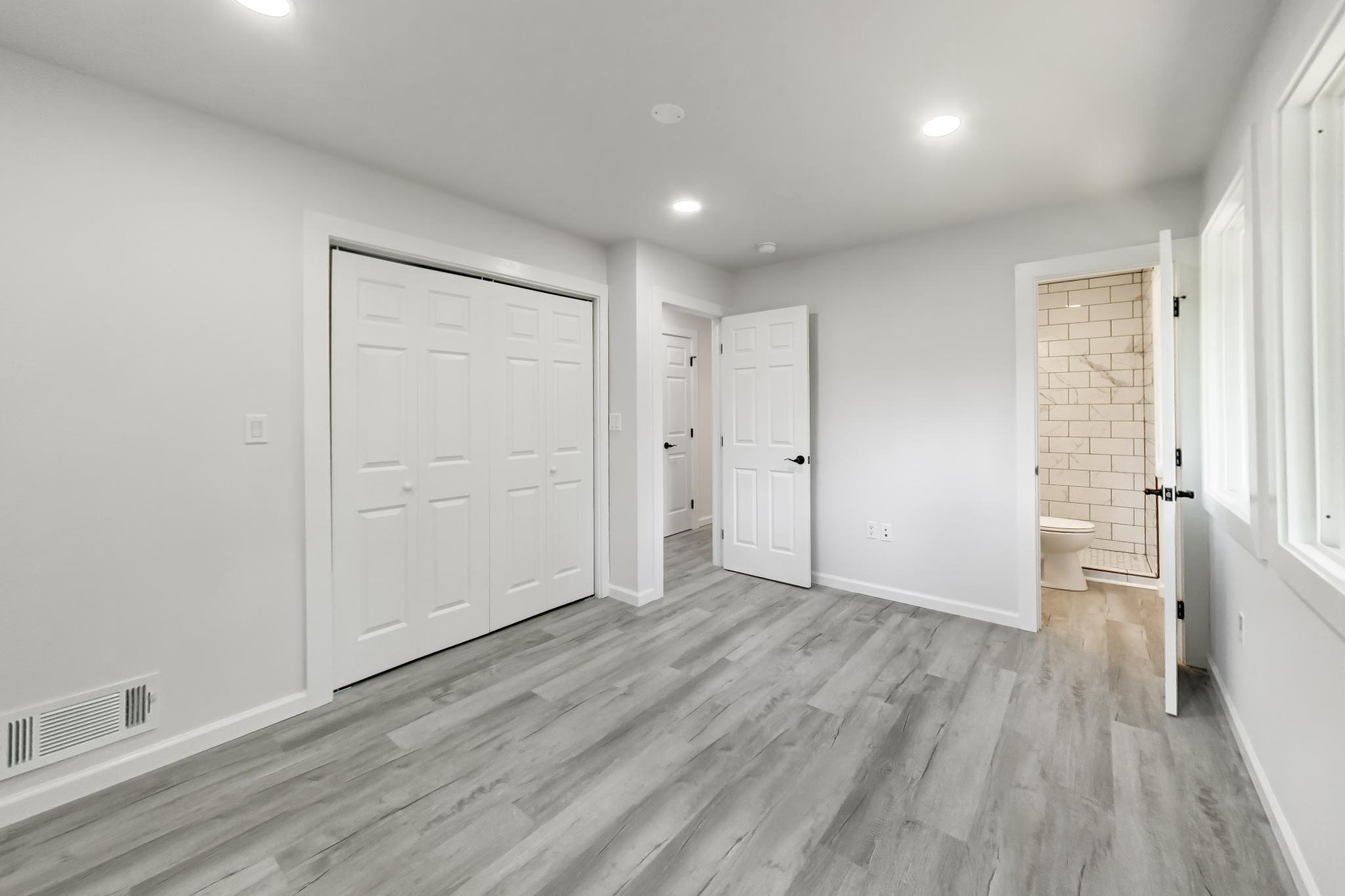 810 Malta Lane Silver Spring, MD 20901 - Photo 15 of 35 Bright, airy bedroom with modern finishes.