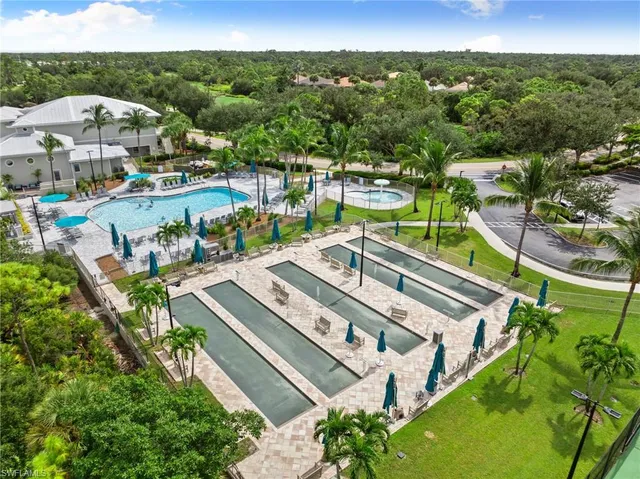 a view of a city with lawn chairs