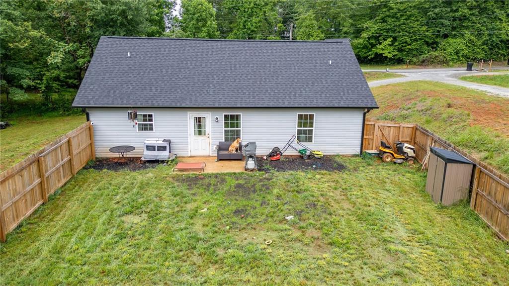 118 Wash Rider Road Dahlonega, GA 30533 - Photo 36 of 37 a aerial view of a house with swimming pool garden and patio