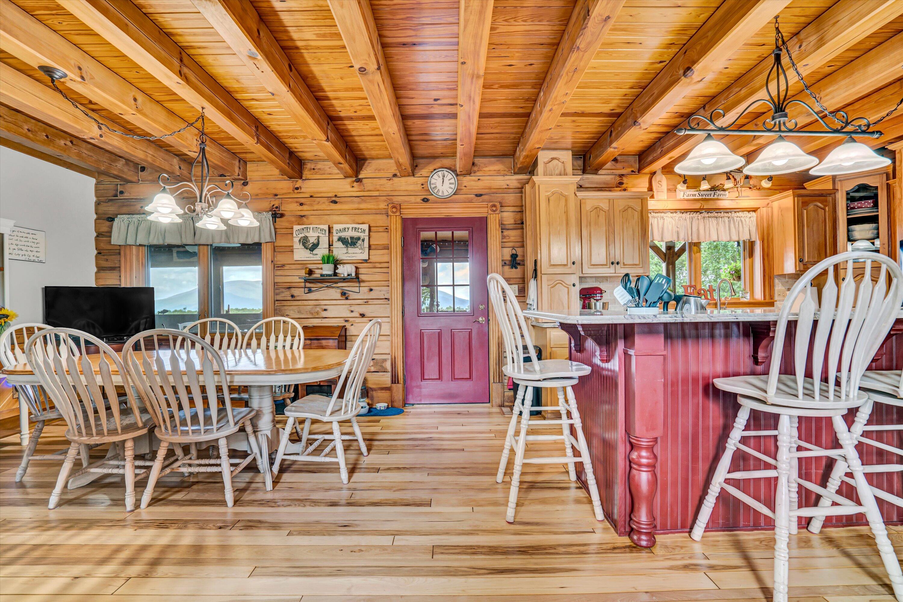 500 Jacksons Flat Covington, VA 24426 - Photo 15 of 102 a view of a dining room with furniture window and wooden floor