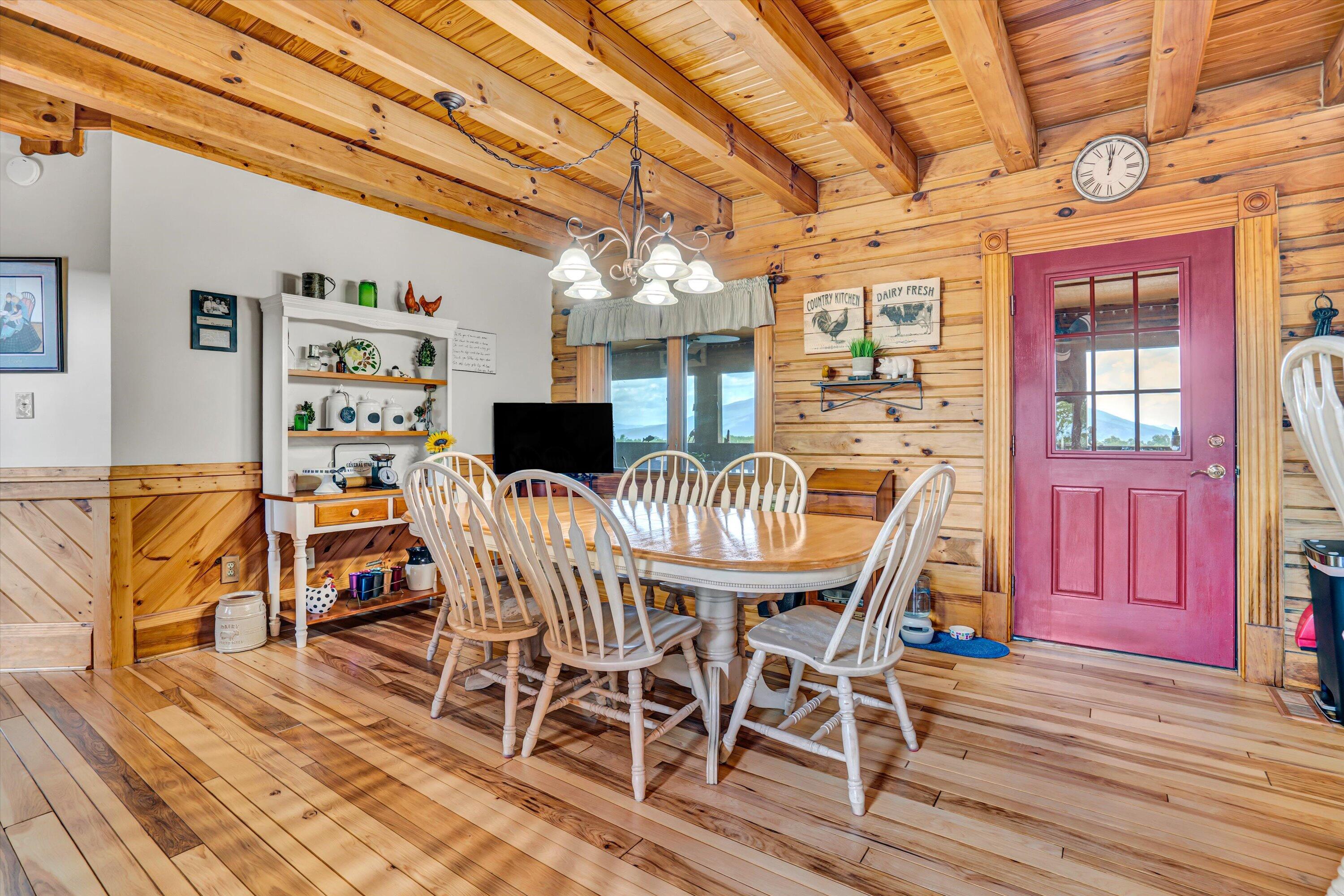 500 Jacksons Flat Covington, VA 24426 - Photo 16 of 102 a view of a dining room with furniture window and wooden floor