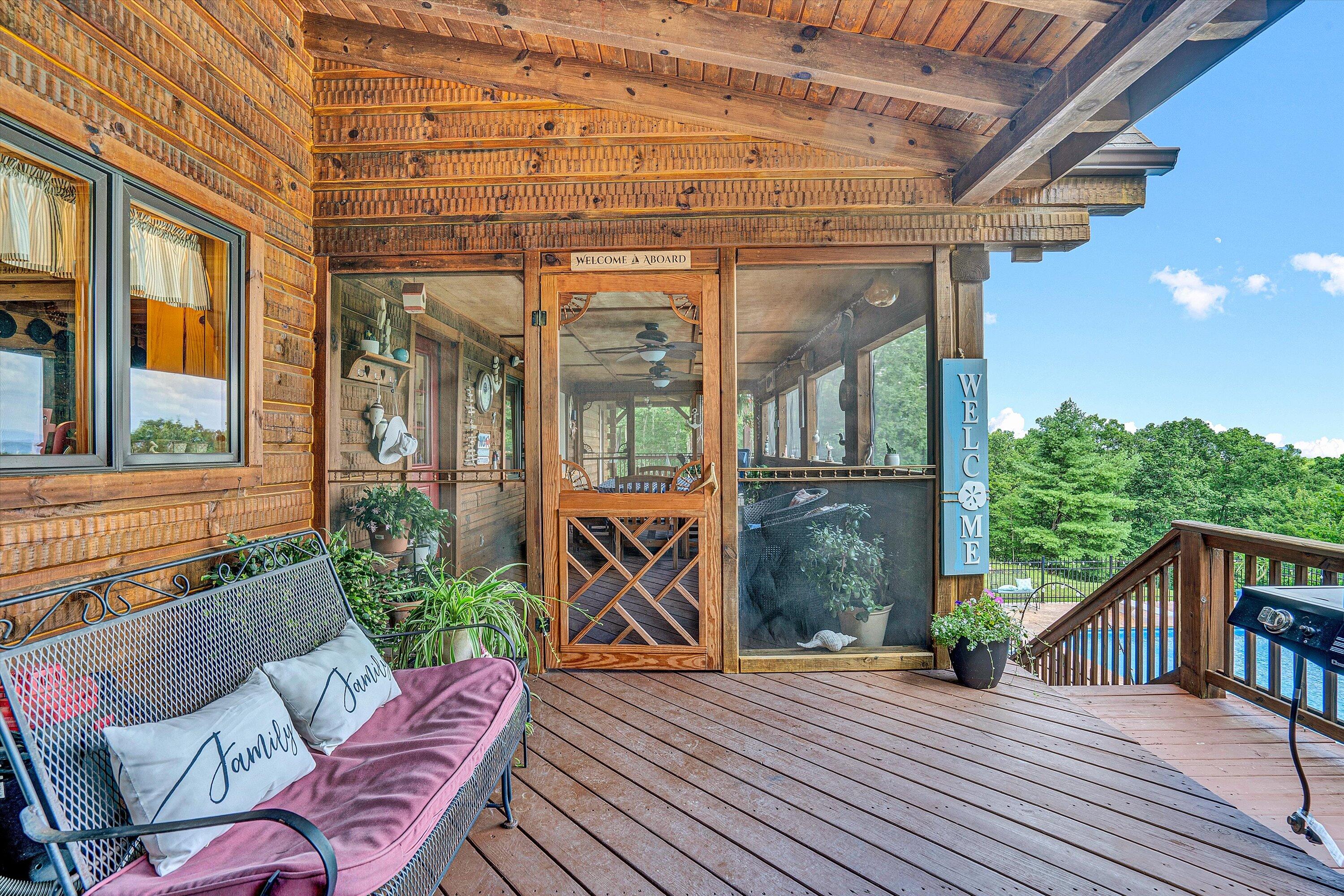 500 Jacksons Flat Covington, VA 24426 - Photo 38 of 102 a view of a porch with furniture and wooden floor