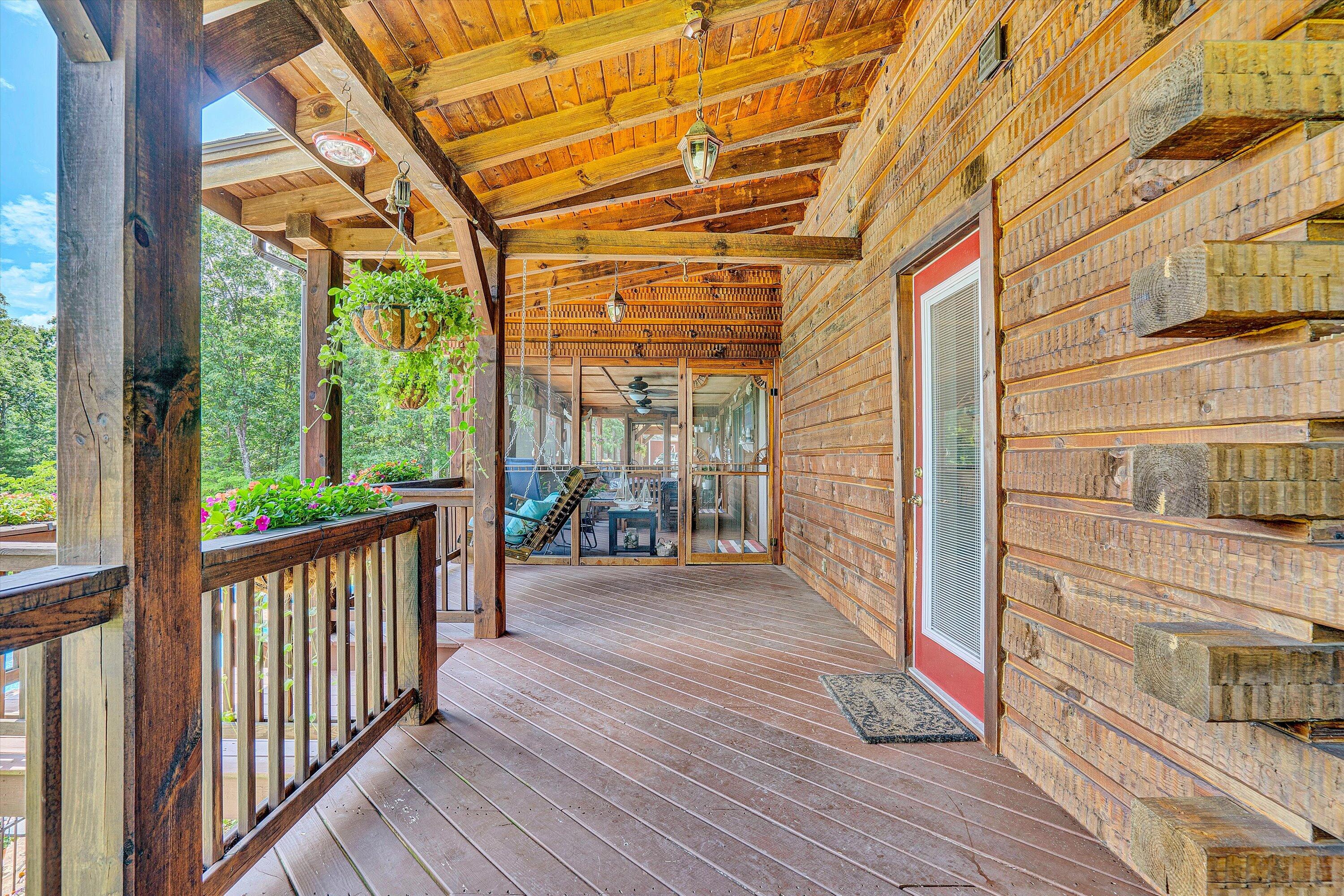 500 Jacksons Flat Covington, VA 24426 - Photo 46 of 102 a view of a porch with wooden floor