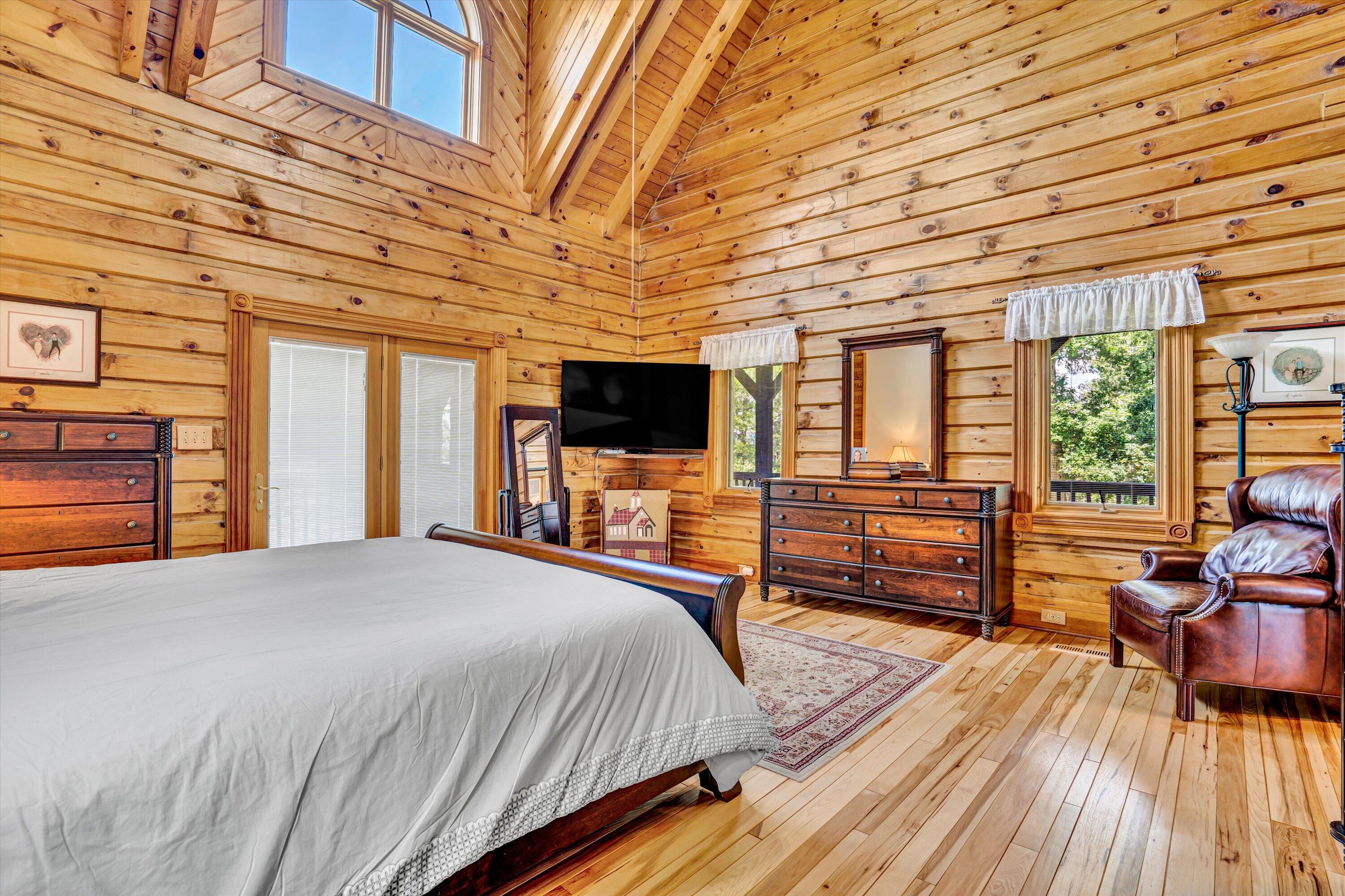 500 Jacksons Flat Covington, VA 24426 - Photo 53 of 102 a bedroom with a bed and wooden floor