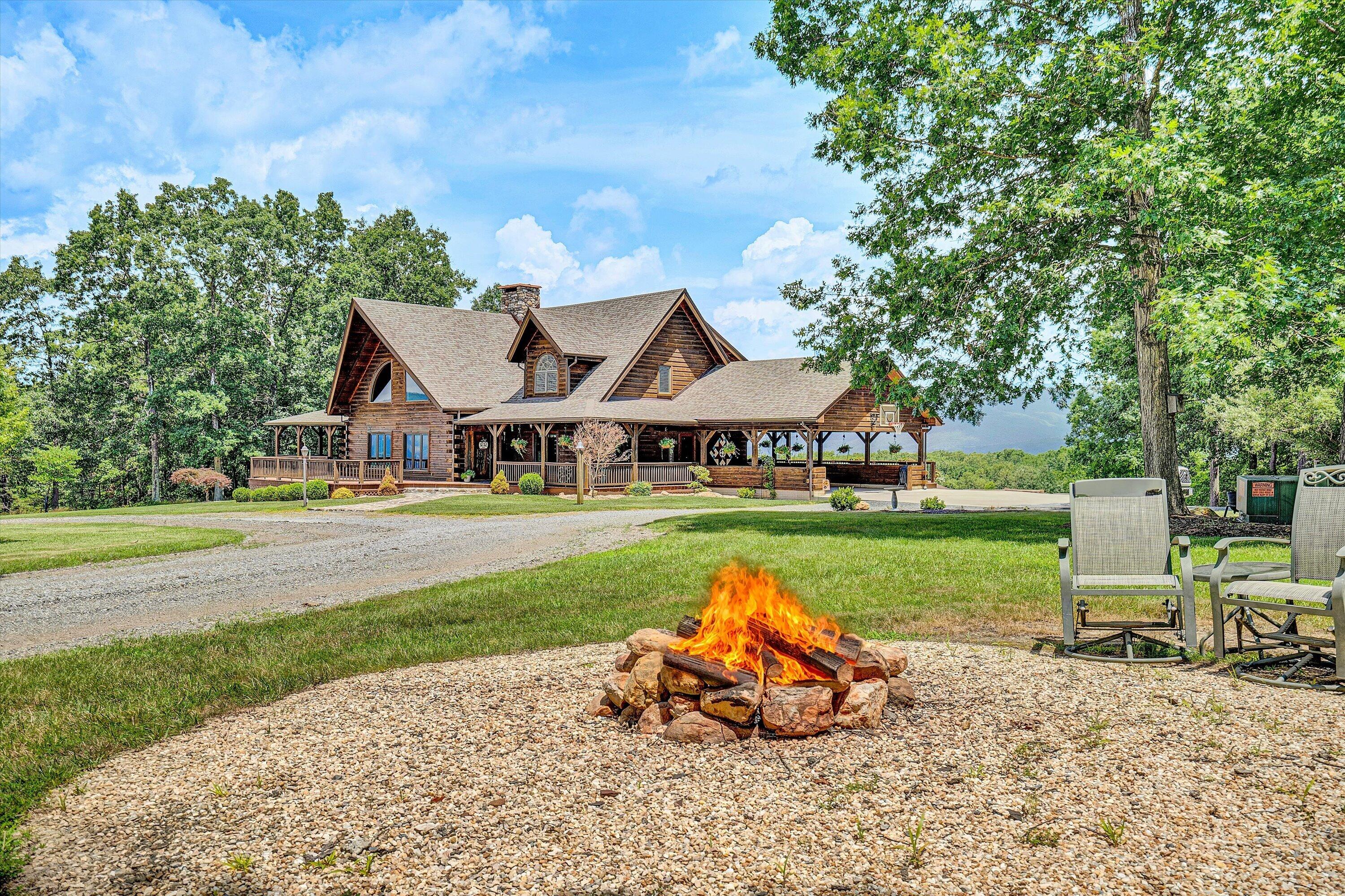500 Jacksons Flat Covington, VA 24426 - Photo 7 of 102 a view of house with outdoor space and garden