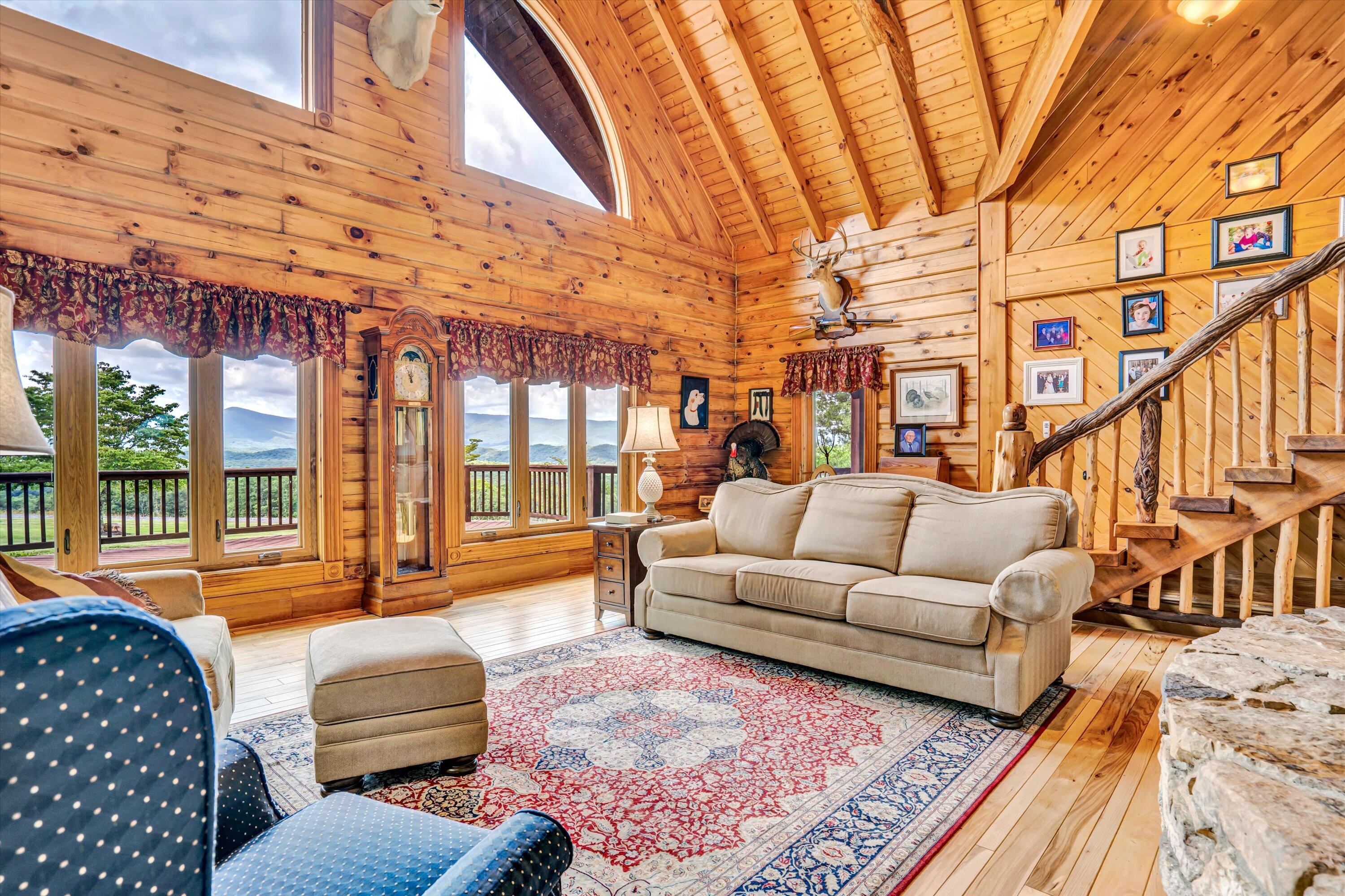 500 Jacksons Flat Covington, VA 24426 - Photo 9 of 102 a living room with furniture or couch and a large window