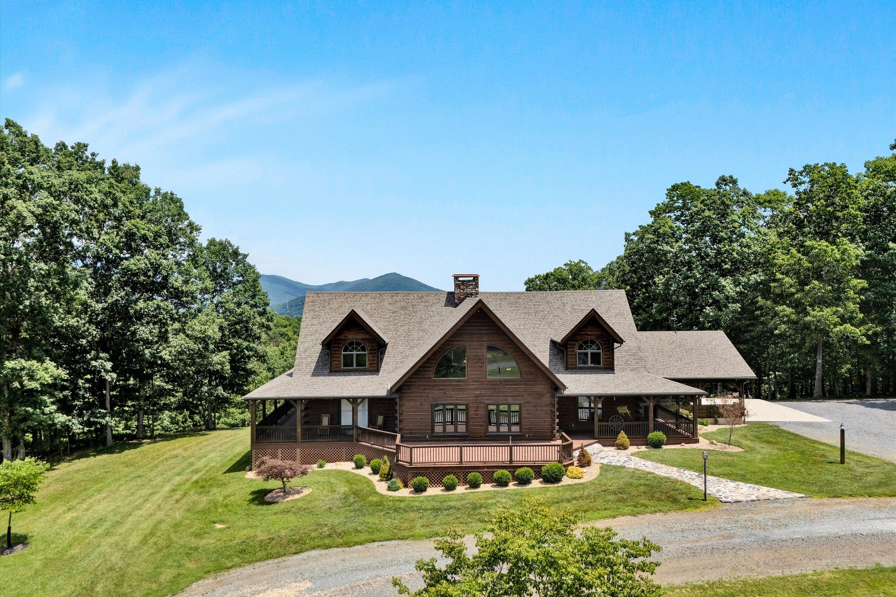 500 Jacksons Flat Covington, VA 24426 - Photo 100 of 102 a front view of a house with a yard